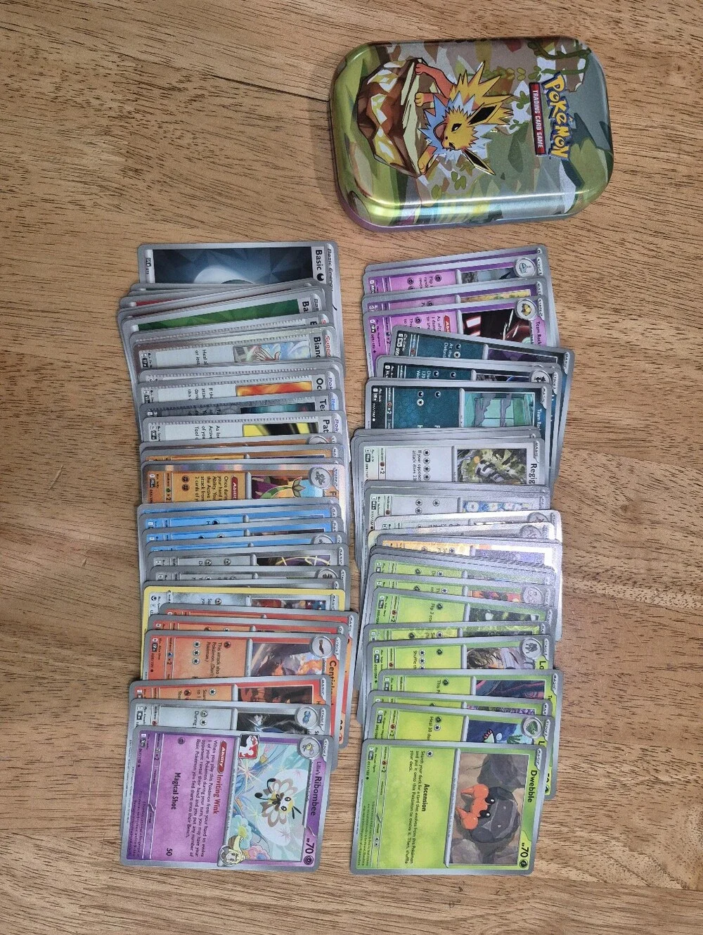 Pokemon misc card bundle 75 cards with  collectible mini tin